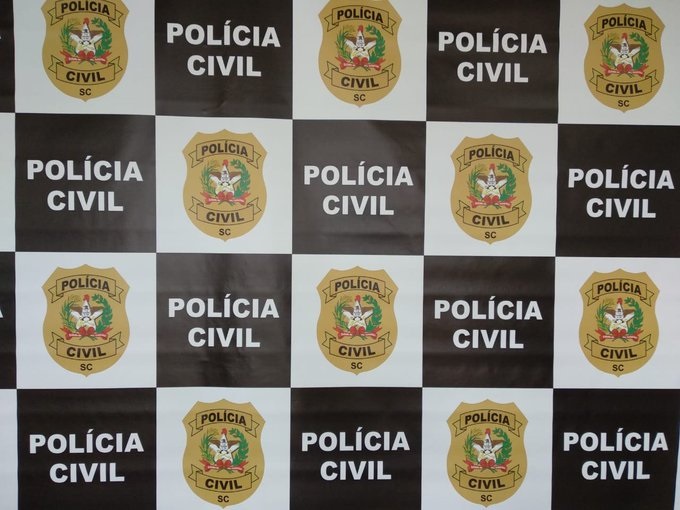 Banner com a logo da Polícia Civil.